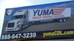 Yuma Truck Driving School billboard with a semi truck, 888-647-3239 and yumaCDL.com